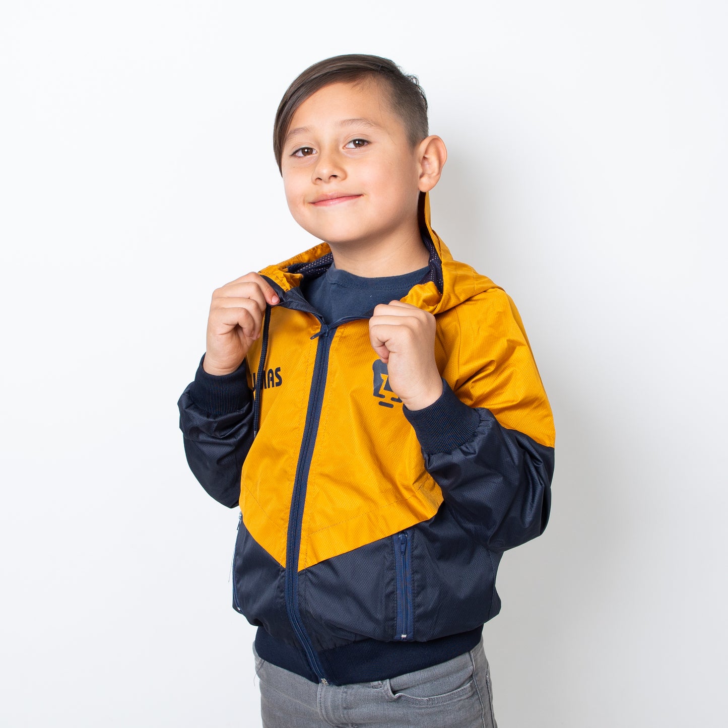 Rompevientos Infantil PUMAS – Diseño Oficial en Oro y Azul